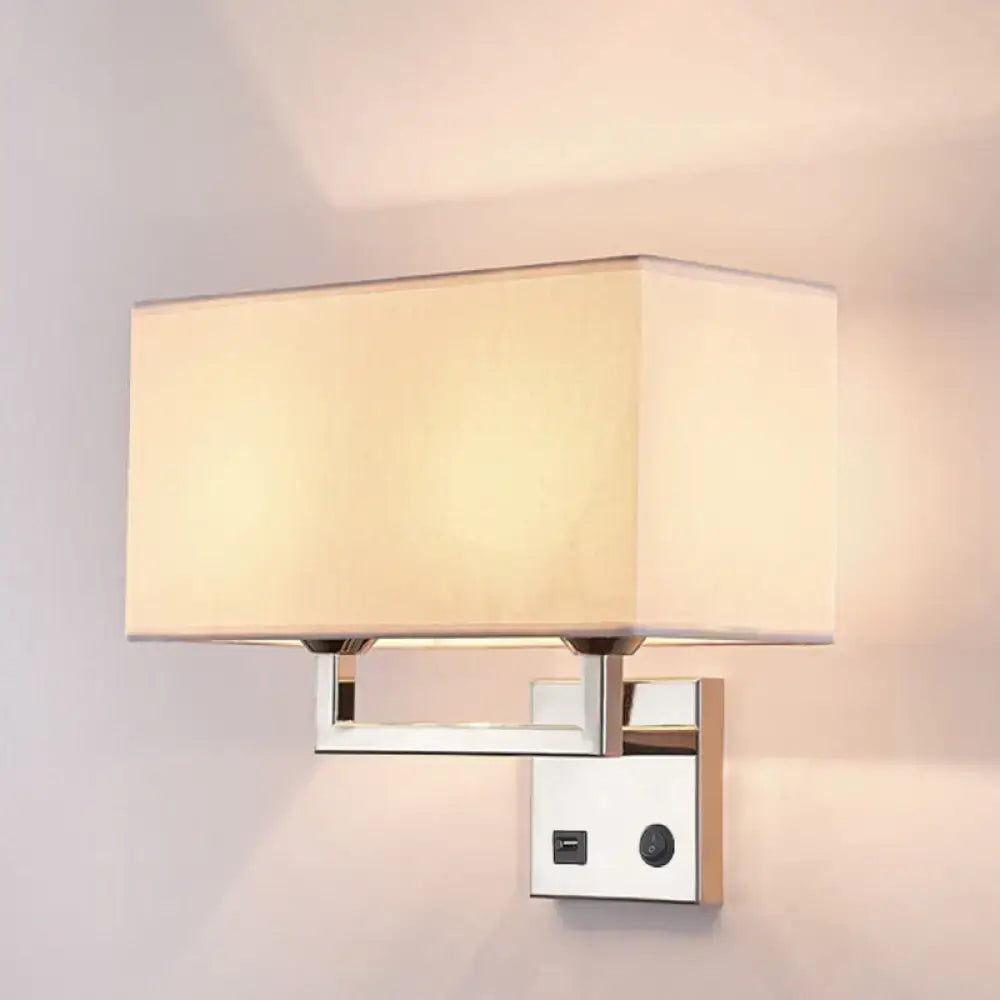 Modern cuboidal fabric wall light in beige white with cream fabric shade and polished chrome frame featuring usb ports