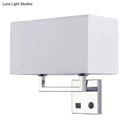 Modern cuboidal fabric wall light with beige white fabric shade chrome frame and integrated usb port and switch mounting plate