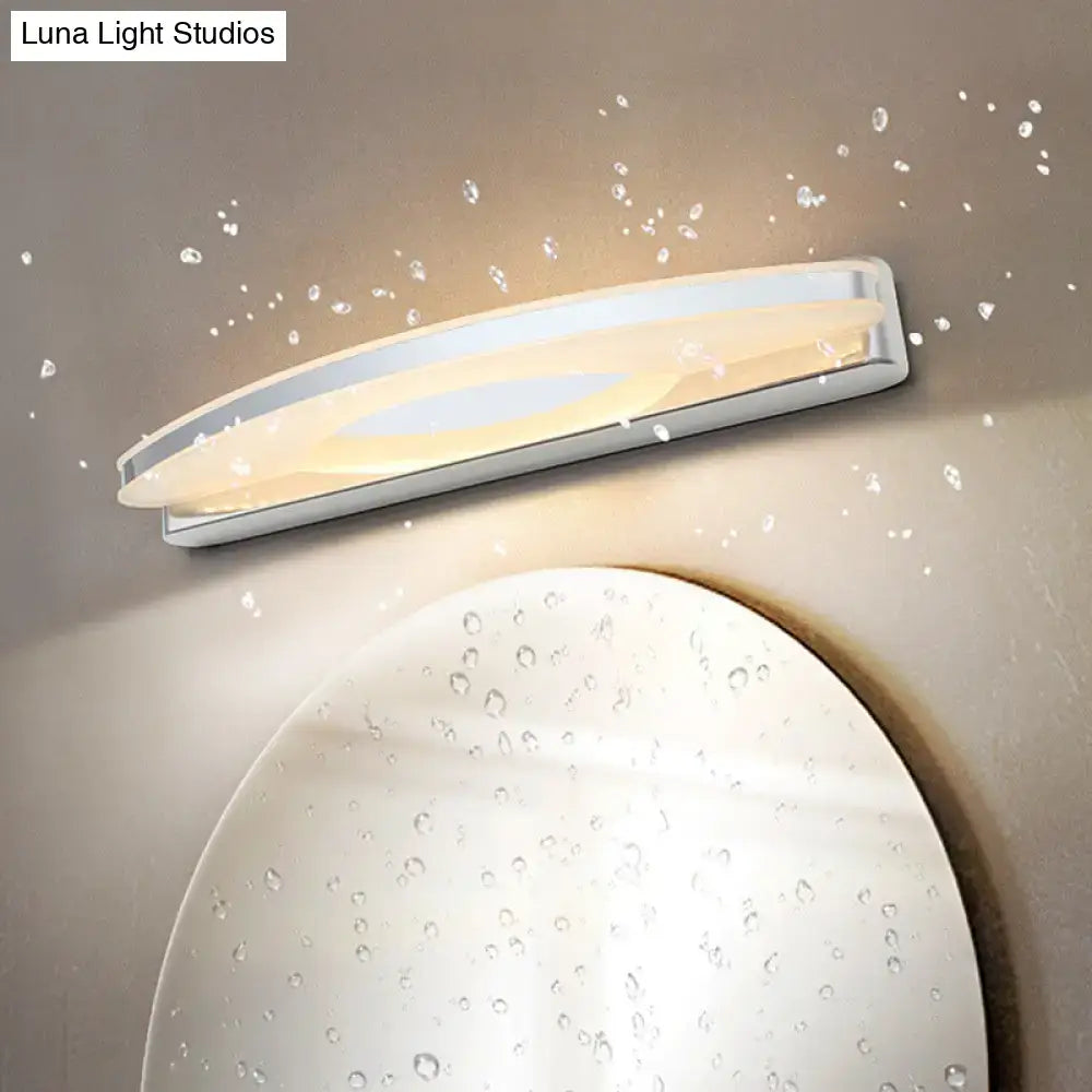 Modern curved led vanity chrome bathroom light with silver frame and warm glow in sleek curved design