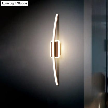 Modern curved linear gold and coffee led wall sconce with sleek curved linear aluminum design and warm lighting for dining room