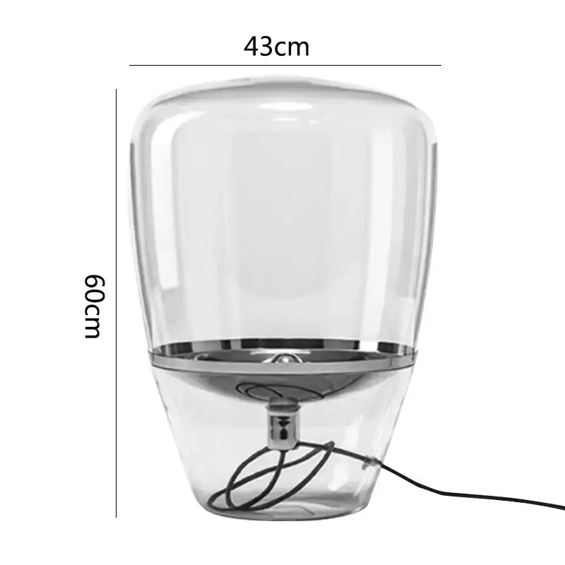 Transparent decorbites glass table lamp with chrome base and integrated power cord for modern bedroom LED lighting
