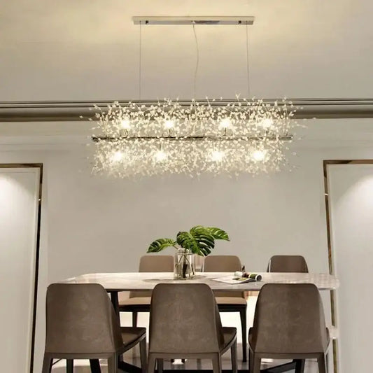 A modern dandelion led crystal chandelier with a sleek metallic frame and clear crystals for dining room decorbites