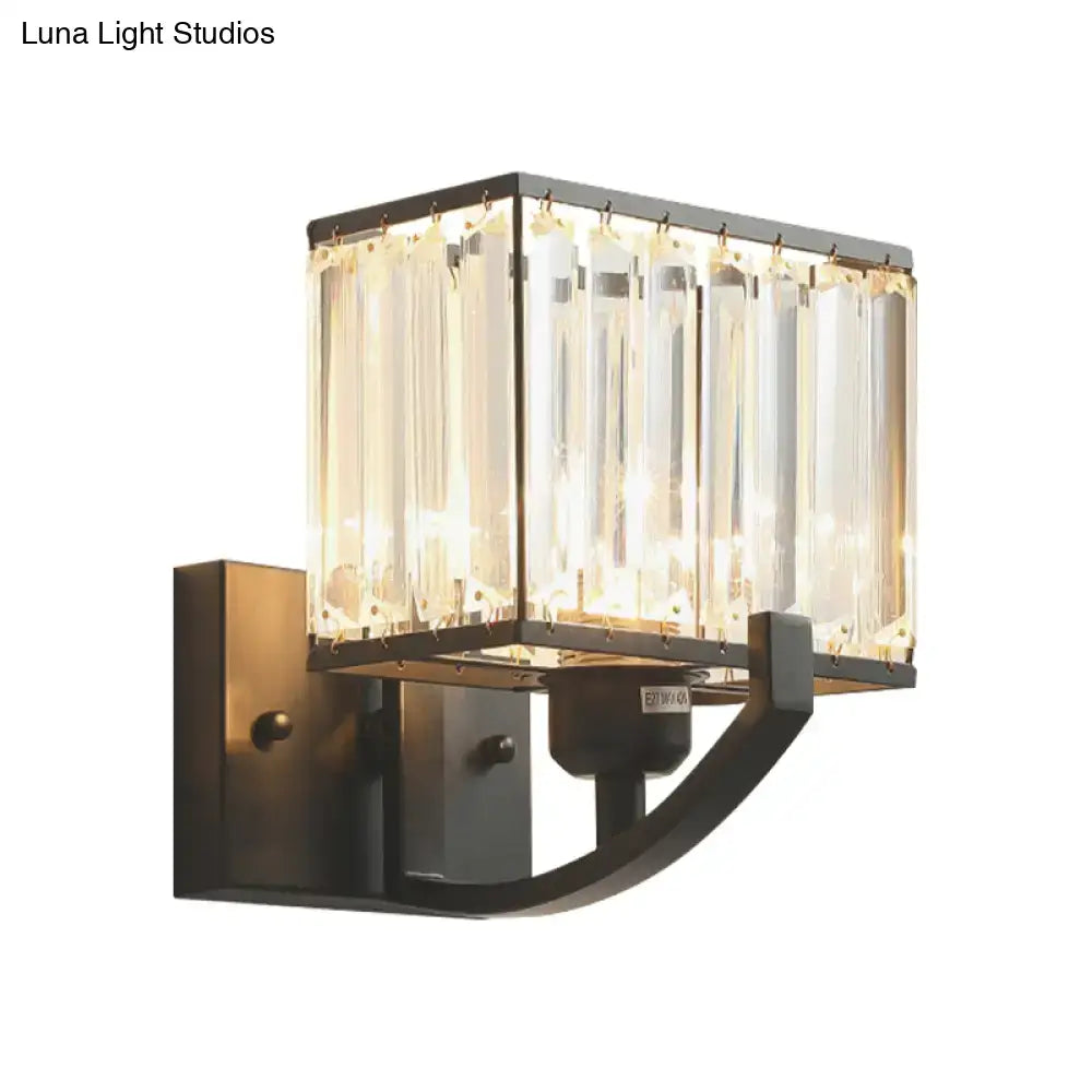 Modern dark bronze wall mount light with black metal frame and vertical crystal panels for bedroom wall mount