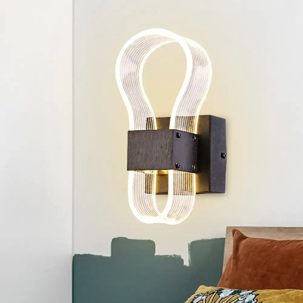 Modern dark bronze led wall lamp with ribbed glass and sleek white warm light led wall sconce on dark wood metal base