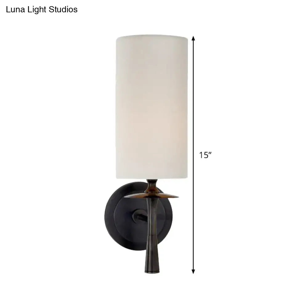 Modern dark bronze sconce light with matte black metal base and white glass shade for bedroom use