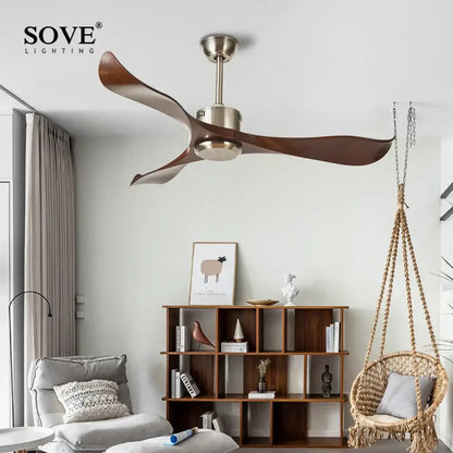 Modern dark brown ceiling fan with remote control featuring sleek bronze metal housing and three curved wooden blades