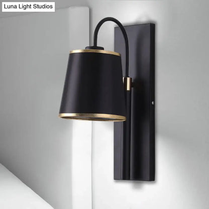 Modern dark brown wall lamp with gold accents and conical shade in matte metal frame for living room sconce use