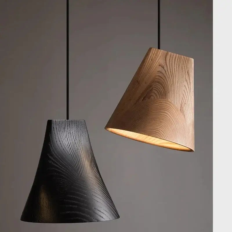 Two modern pendant lights in dark matte and natural wood tones with visible grain for decorbites adjustable wooden chandelier