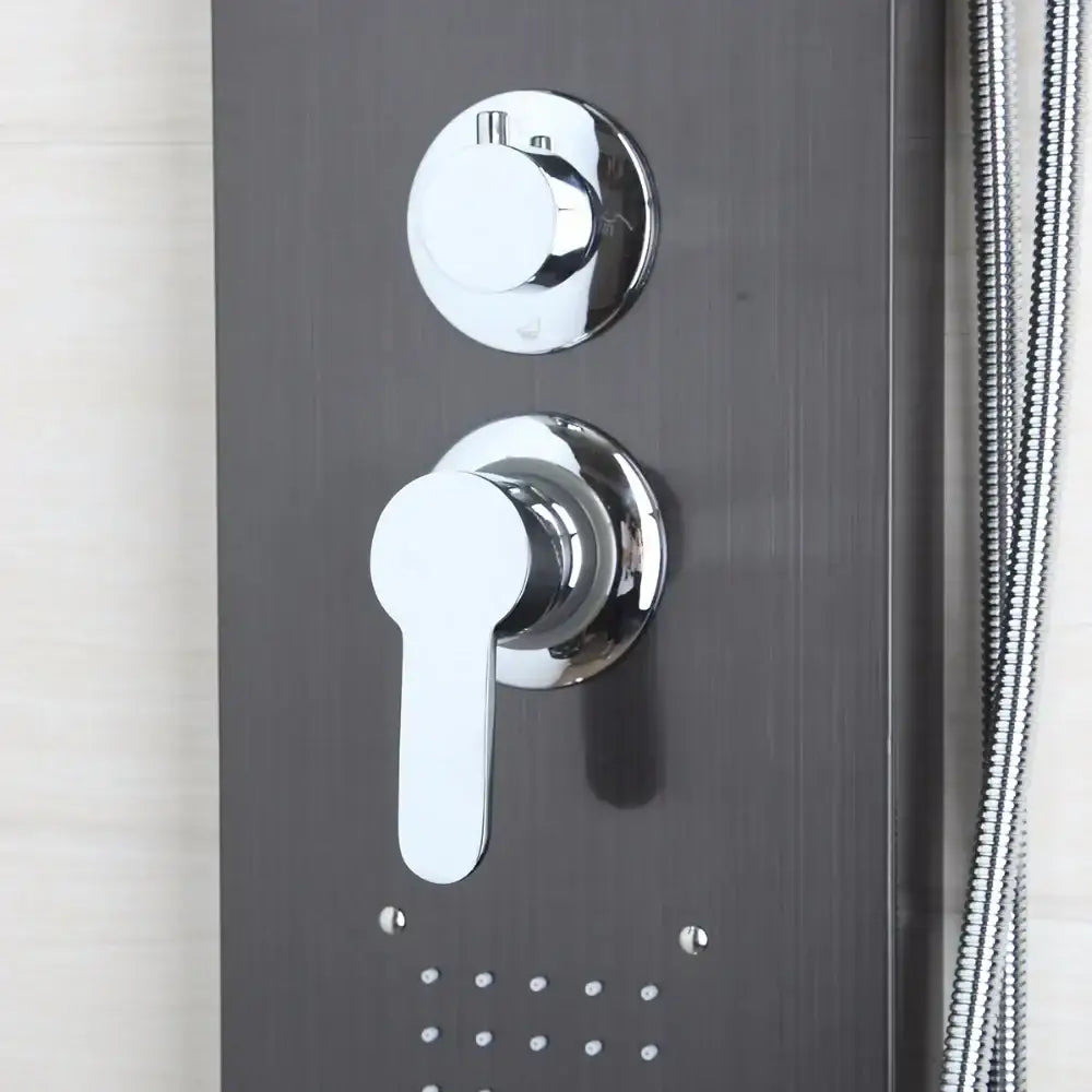 Modern dark nickel shower panel with massage system featuring chrome knobs and handle on a matte black wall plate decorbites dark nickel