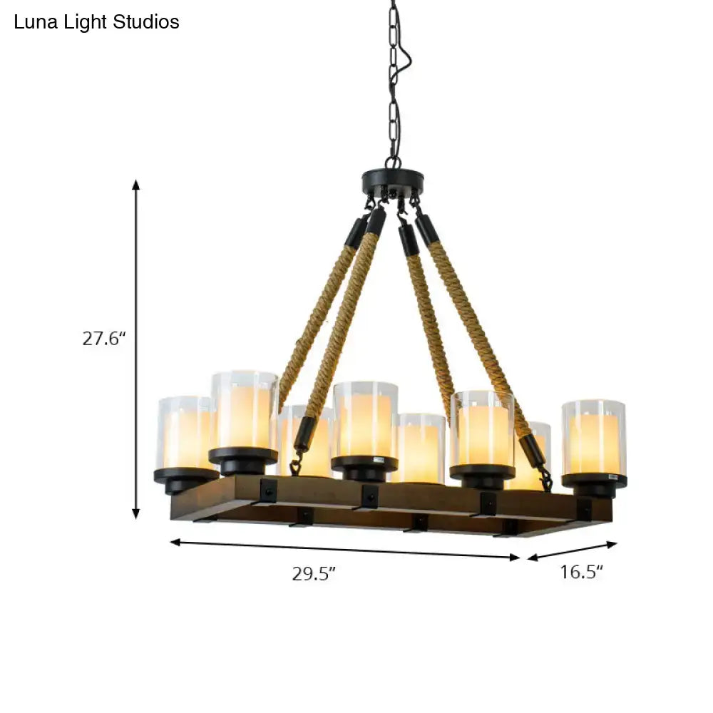 Modern dark wood island chandelier with black metal accents and white glass shade for dining room lighting
