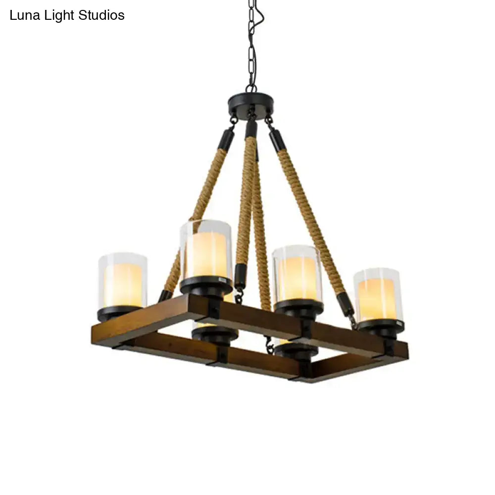Rustic farmhouse-style chandelier with dark wood frame, black metal accents, beige rope, and white glass shade for dining room