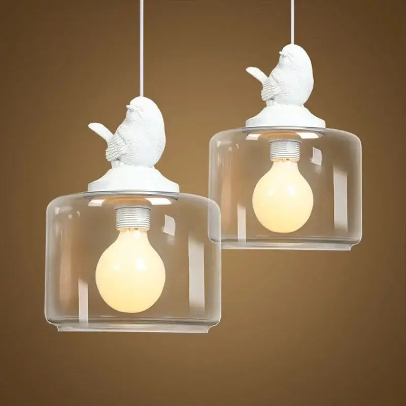 Modern decorbites bird led glass chandelier features white bird-shaped pendant lights with clear glass shades for dining room use