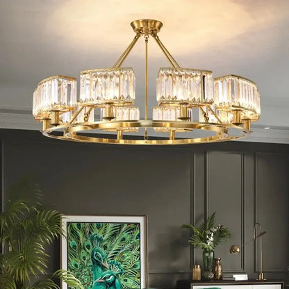 Modern decorbites copper crystal chandelier with gold-toned frame and faceted crystal bars for dining room lighting