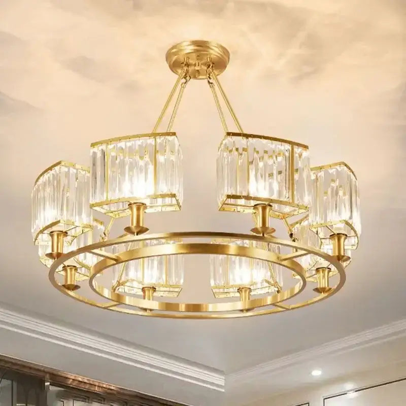 Modern decorbites copper crystal chandelier with gold-toned frame and clear prisms for dining room lighting