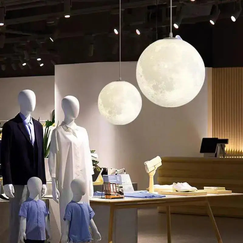 Two spherical cream moon led pendant chandelier lights in decorbites cream moon design with soft white glow for living room