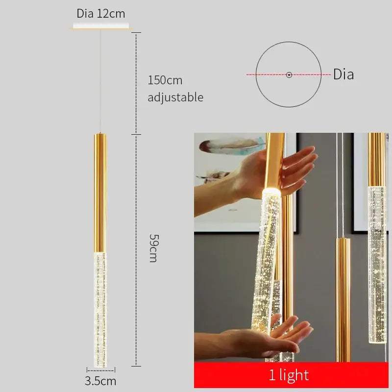 Gold-finished cylindrical pendant light with clear crystal section and internal led bulb from decorbites crystal gold chandelier