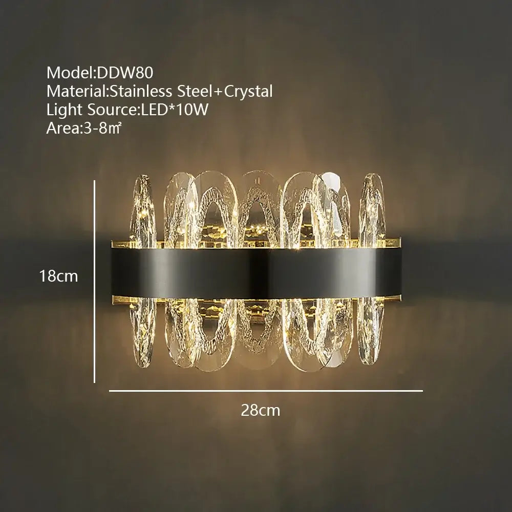Modern decorbites crystal led wall sconce with sleek black stainless steel base and cascading crystal led chandelier elements