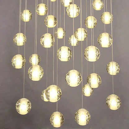 Modern decorbites crystal led chandelier with frosted glass orbs and warm internal lighting for living room pendant light