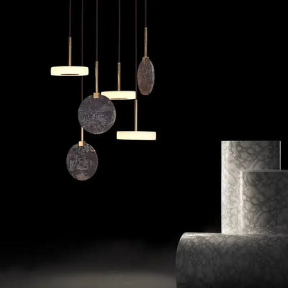 Modern decorbites deco wood and marble led chandelier with circular textured gray stone shades and gold metal fixtures
