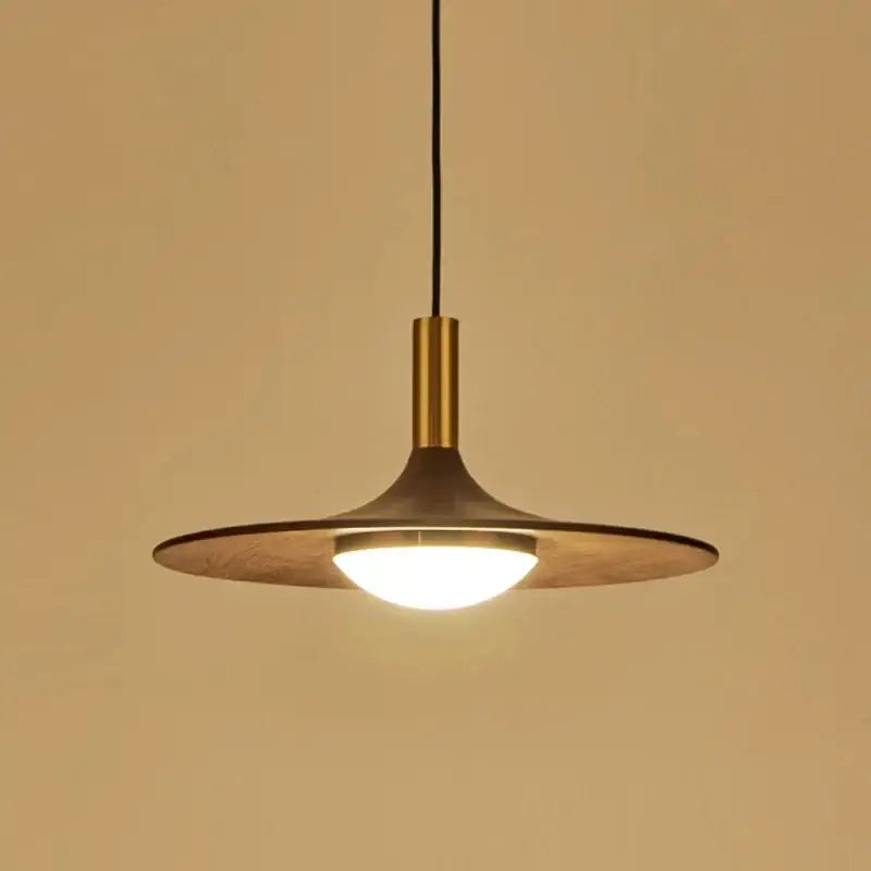 Modern decorbites flying saucer solid wood chandelier with warm brass cylindrical stem and wide flat disc shade illuminating bedroom
