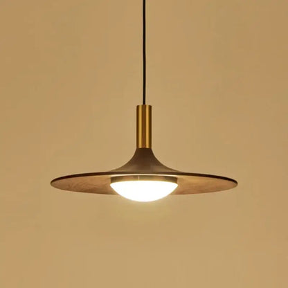 Modern decorbites flying saucer solid wood chandelier with warm brass cylindrical stem and wide flat disc shade illuminating bedroom