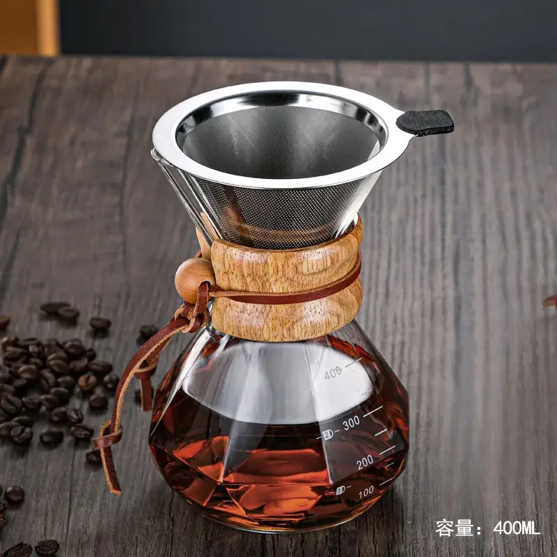 A 400ml decorbites glass coffee maker with stainless steel filter, wooden collar, and leather tie for kitchen use