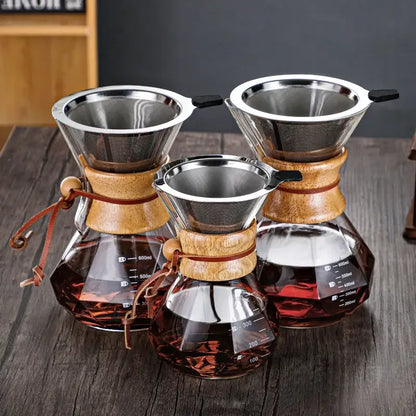 Set of three glass coffee makers with stainless steel filters and wooden collars featuring leather ties by decorbites