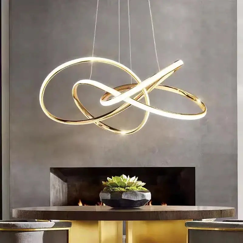 Gold-toned infinity-loop pendant light from decorbites gold ring led chandelier for modern dining room lighting