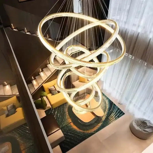 Modern decorbites gold rings crystal chandelier with golden spiral interlocking rings and embedded crystal accents