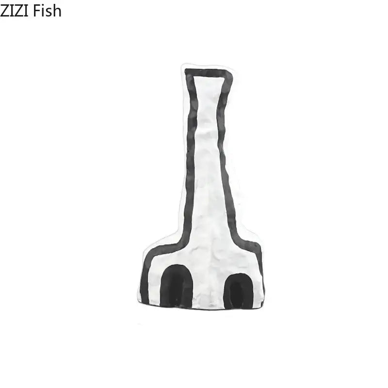 Black and white textured metal fish-shaped pin complementing modern design decorbites abstract vase set bedroom decor