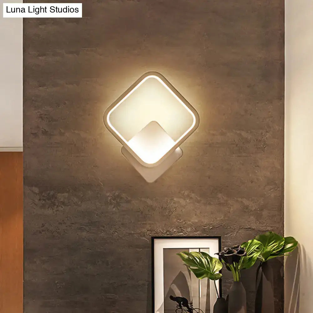 Modern diamond-shaped white led wall lamp with sleek frame and warm diffused lighting for bedroom sconce light
