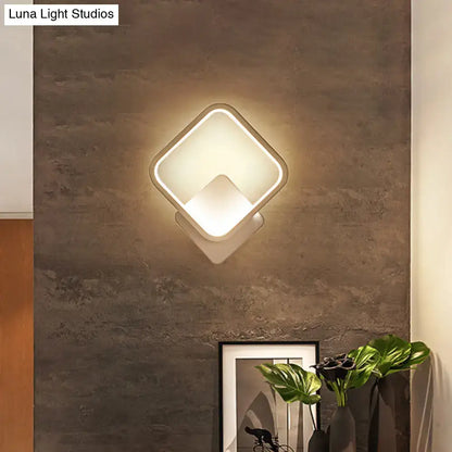 Modern diamond-shaped white led wall lamp with sleek frame and warm diffused lighting for bedroom sconce light