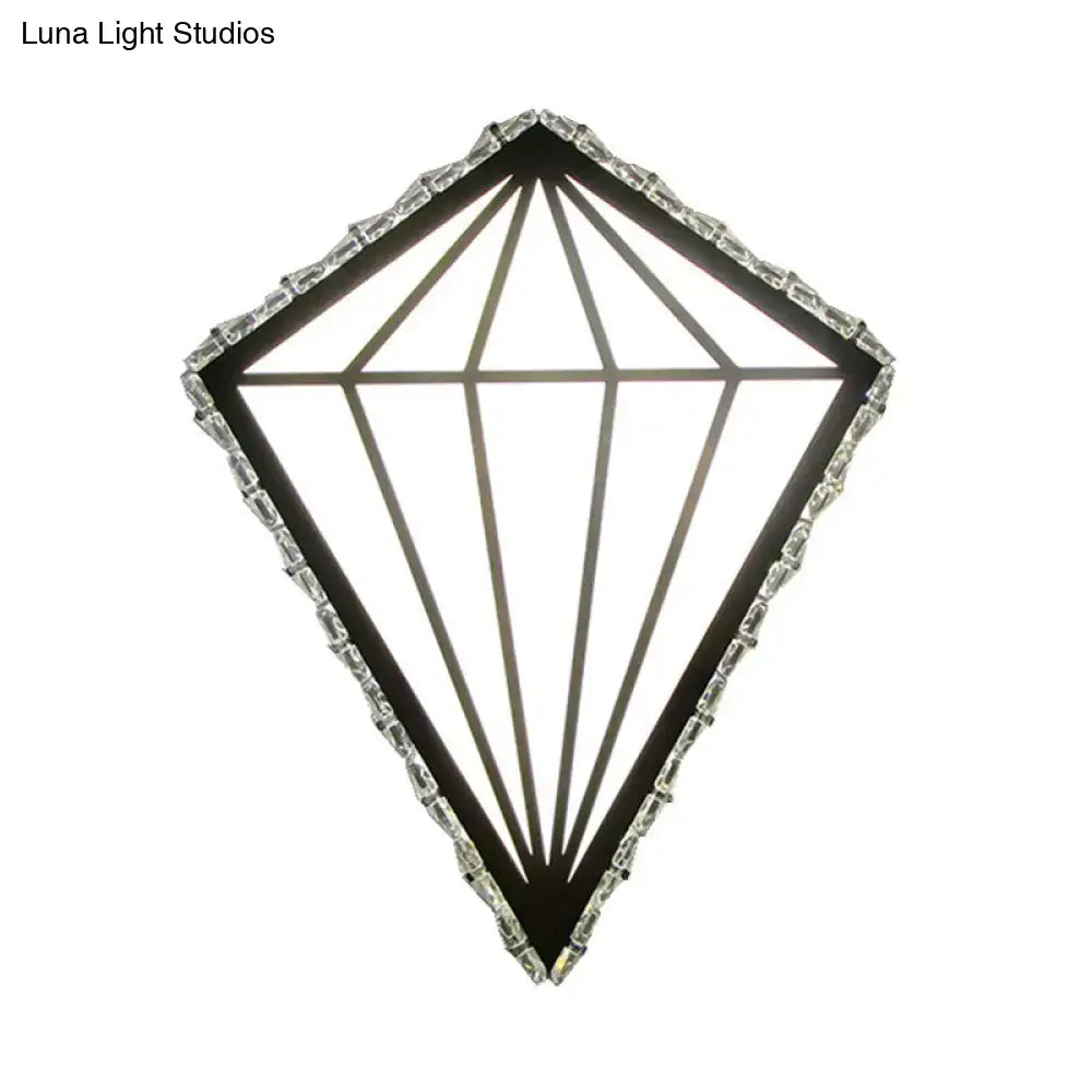Modern diamond white wall light with black frame and clear crystal accents providing warm white light bulb base