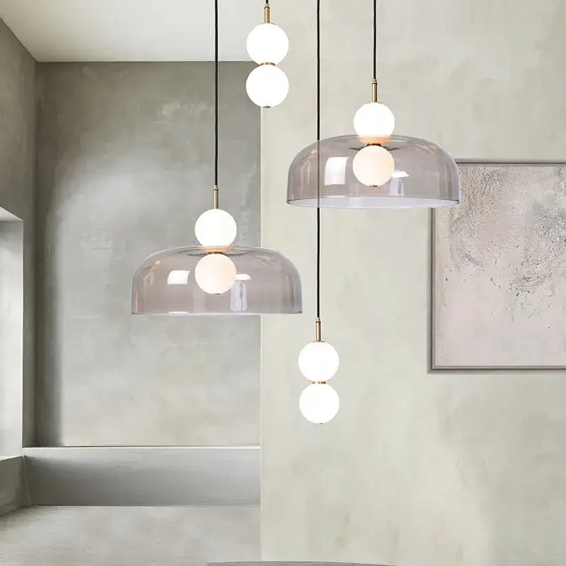 Modern double balls glass chandelier pendant light with frosted glass domes and white bulbs suspended by black cords