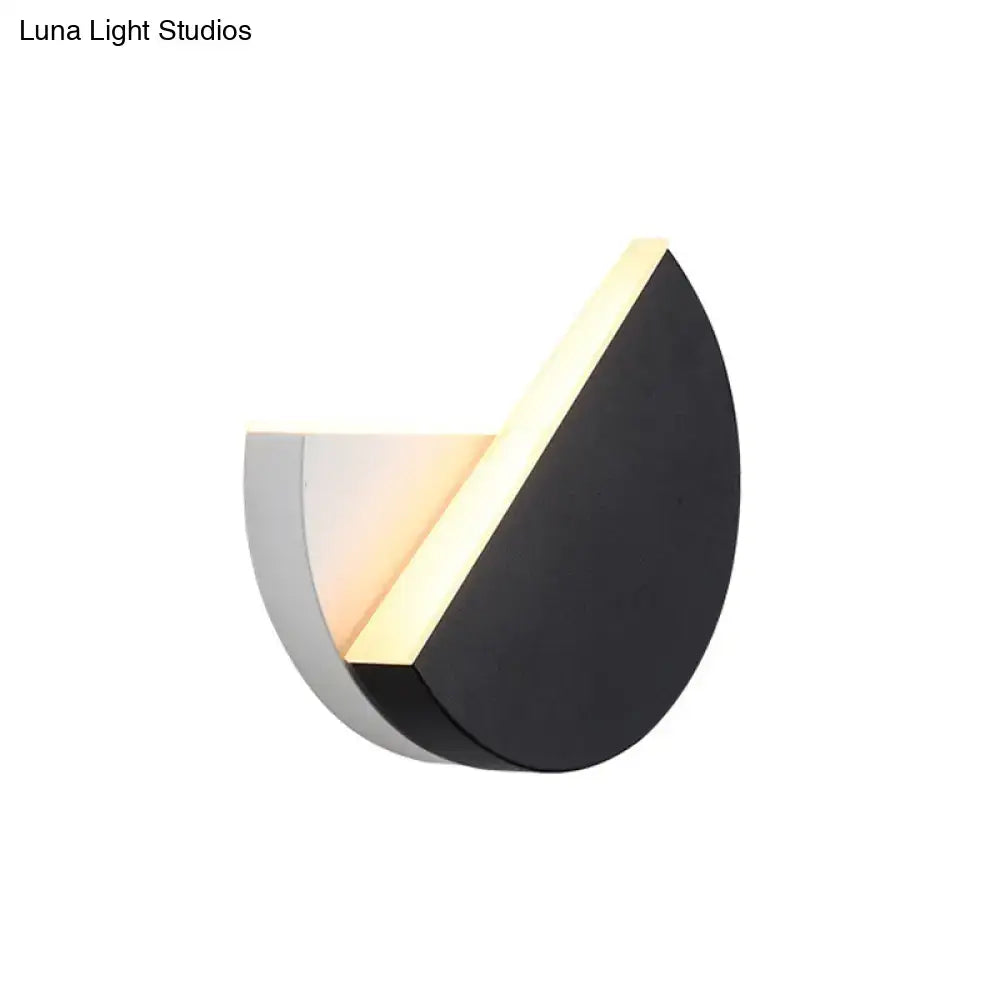 Modern double semicircle wall lamp featuring sleek black and silver metallic finishes with warm led edge lighting