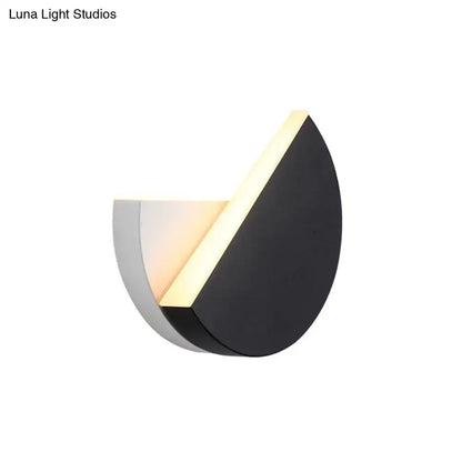 Modern double semicircle wall lamp featuring sleek black and silver metallic finishes with warm led edge lighting