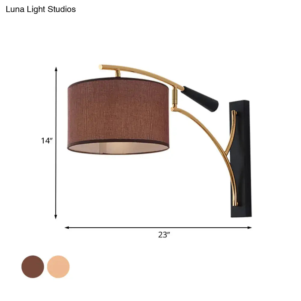 Modern drum shade wall lamp in flaxen coffee with bronze metal arm and black mount for bedroom reading
