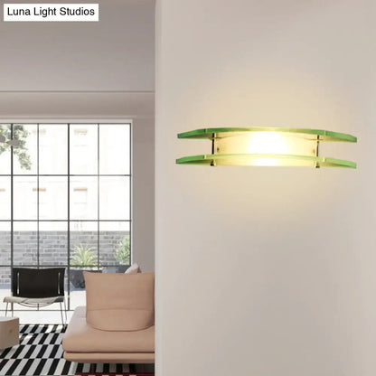 Modern dual arc chrome and green glass wall lamp with clear glass and direct wired electric warm bedroom sconce