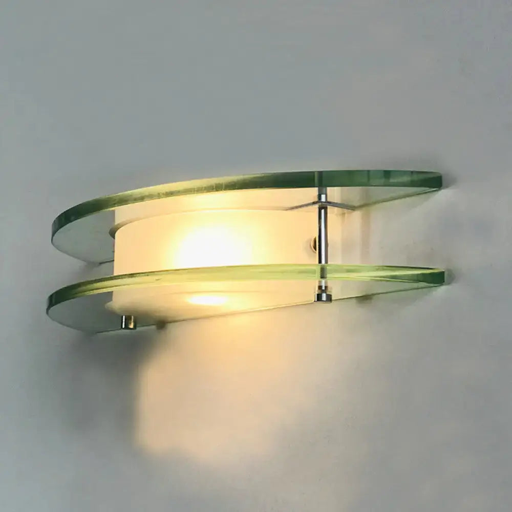 Modern dual arc chrome wall lamp with two curved green glass shelves and direct wired electric warm light for bedroom