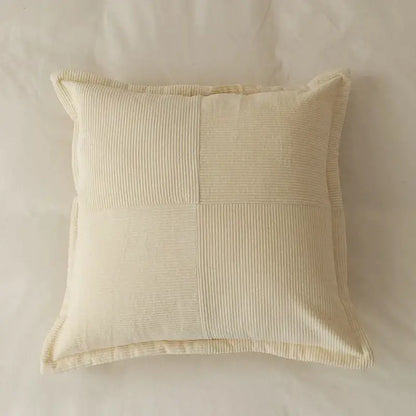 Cream-colored corduroy pillow cover with quilted patchwork design for modern earth tone living room decorbites cushion