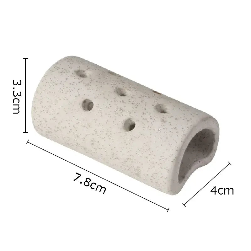A light gray speckled lotus seedpod ceramic incense burner with multiple circular holes and a hollow center