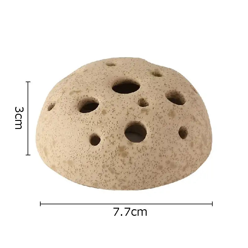 Beige porous modern earthy lotus seedpod ceramic incense burner with circular holes for living room decor