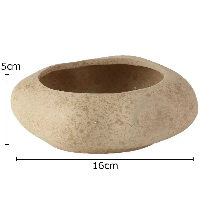 Beige speckled lotus seedpod ceramic incense burner with smooth rounded edges and shallow bowl shape for living room decor