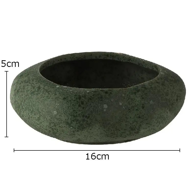 Modern earthy lotus seedpod ceramic incense burner dark green textured stone like bowl with smooth rounded exterior