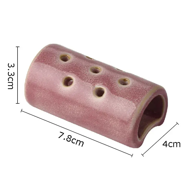 Modern earthy lotus seedpod ceramic incense burner in pink matte finish with multiple circular holes for living room decor