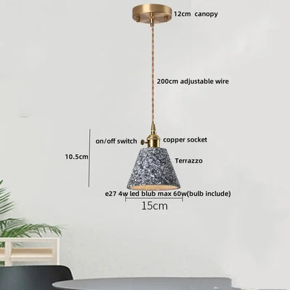 Modern earthy terrazzo stone led pendant light with speckled gray white finish brass hardware and copper suspension for dining room