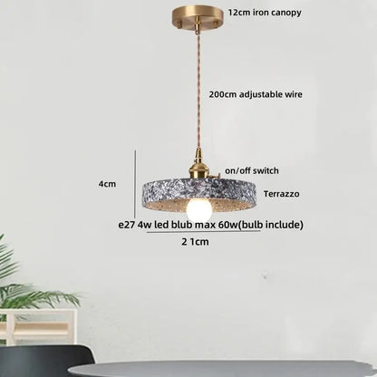 Modern earthy terrazzo stone led pendant light with circular design brass iron canopy and adjustable wire for dining room decorbites terrazzo stone