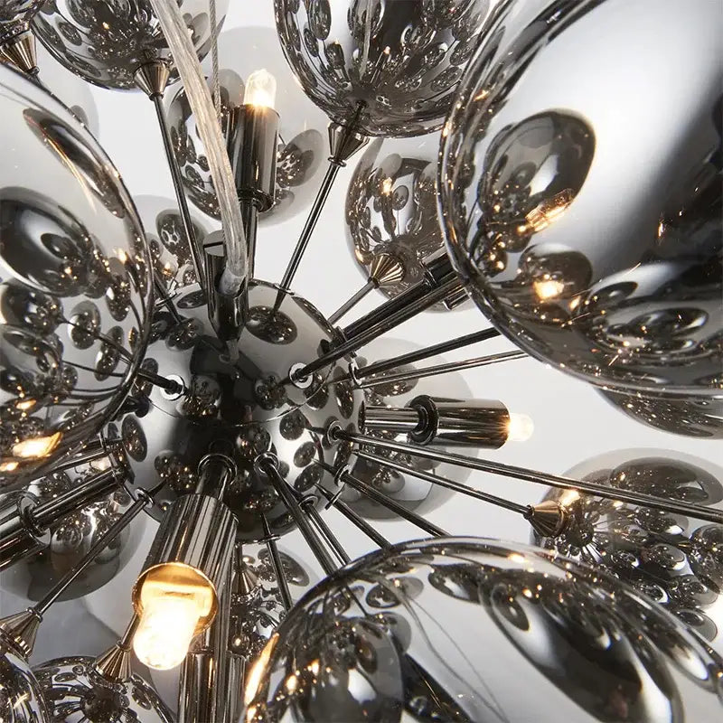 Modern elegant grape glass chandelier featuring chrome finish, intricate reflective orbs, and exposed filament bulbs for dining decorbites elegant grape