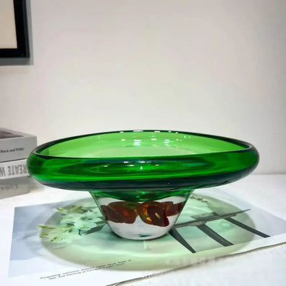 A vibrant green glass decorbites clear fruit tray vase with an amber-brown floral design for living room decor