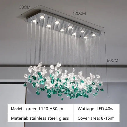 A modern rectangular glass stone chandelier with stainless steel frame and cascading clear and emerald green glass crystals